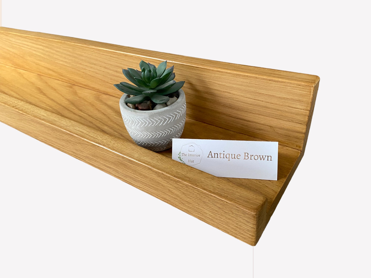 Handmade oak picture shelf with a smooth Antique Brown wax finish