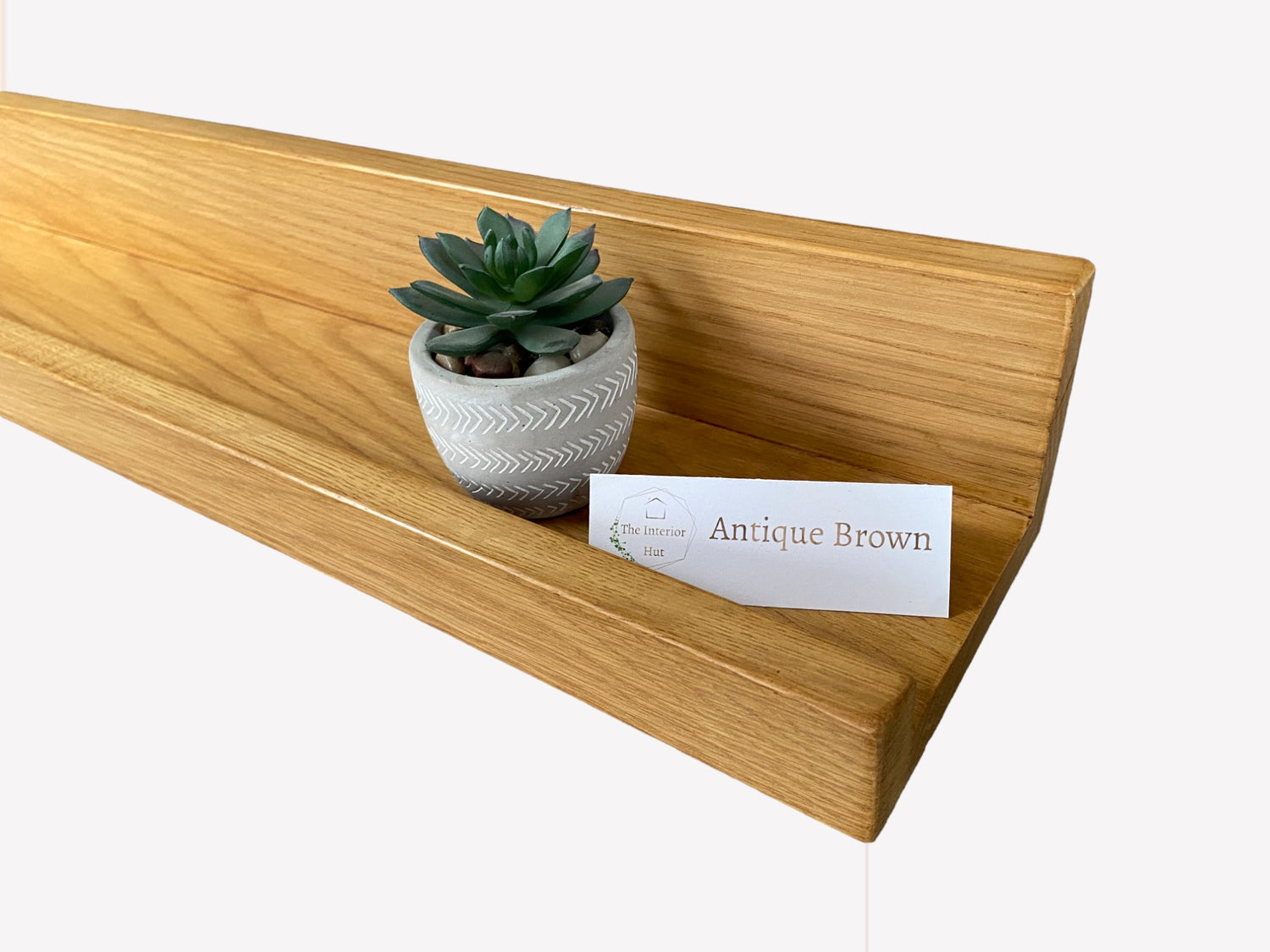 Handmade oak picture shelf with a smooth Antique Brown wax finish