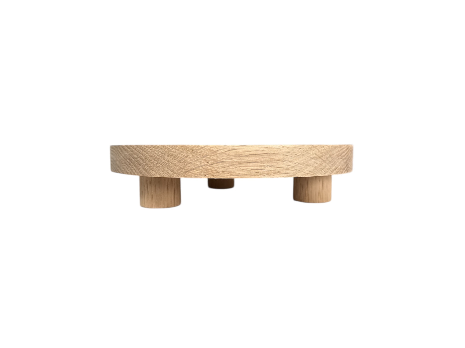 side view of riser tray with three legs